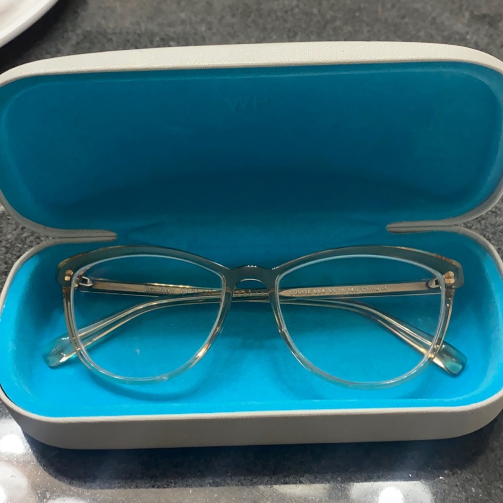 Louise glasses by Warby Parker.